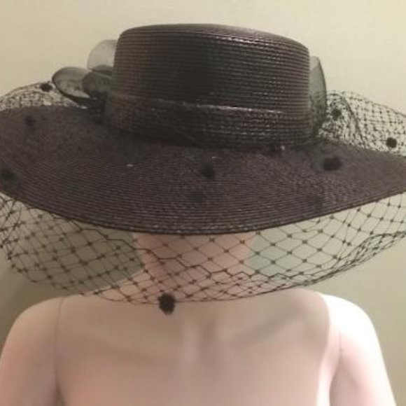Black woven Kentucky Derby hat with flocked netting and black fascinator bow